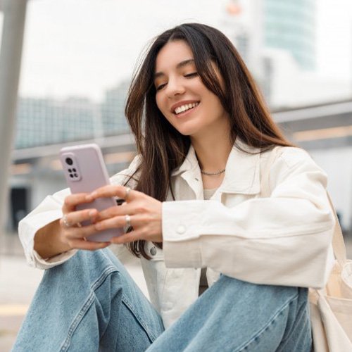 Lady reads something on phone