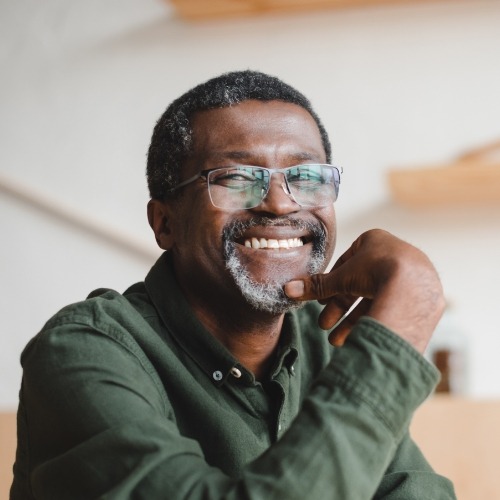 Smiling older man with dental sealants