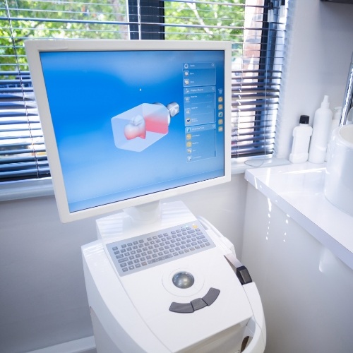 Computer screen showing a digital model of a CEREC one visit dental crown