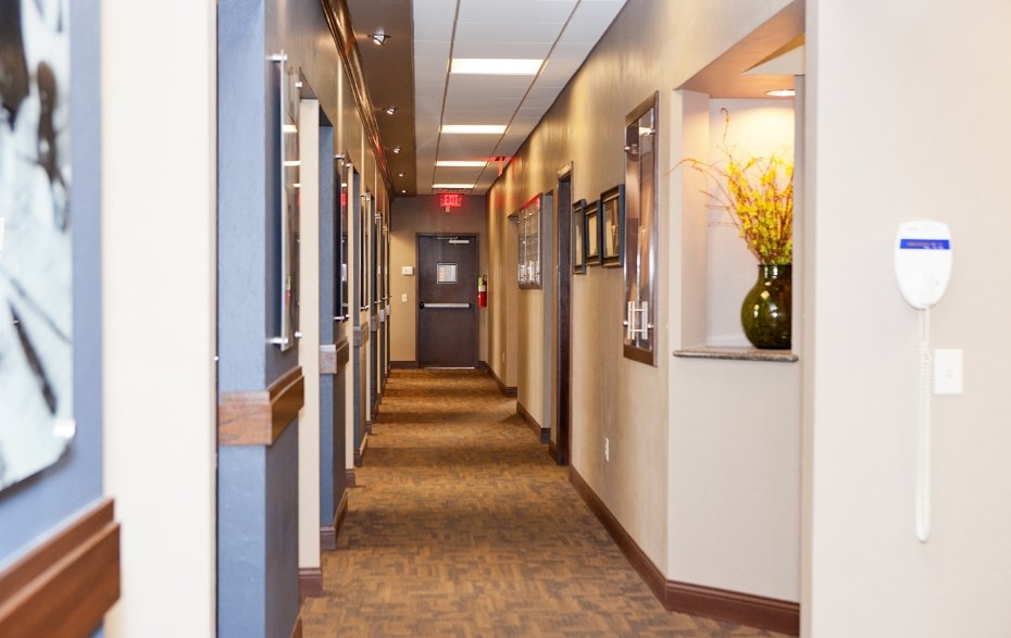 Carpeted hallway in dental office