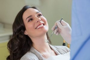 woman happy at dentist