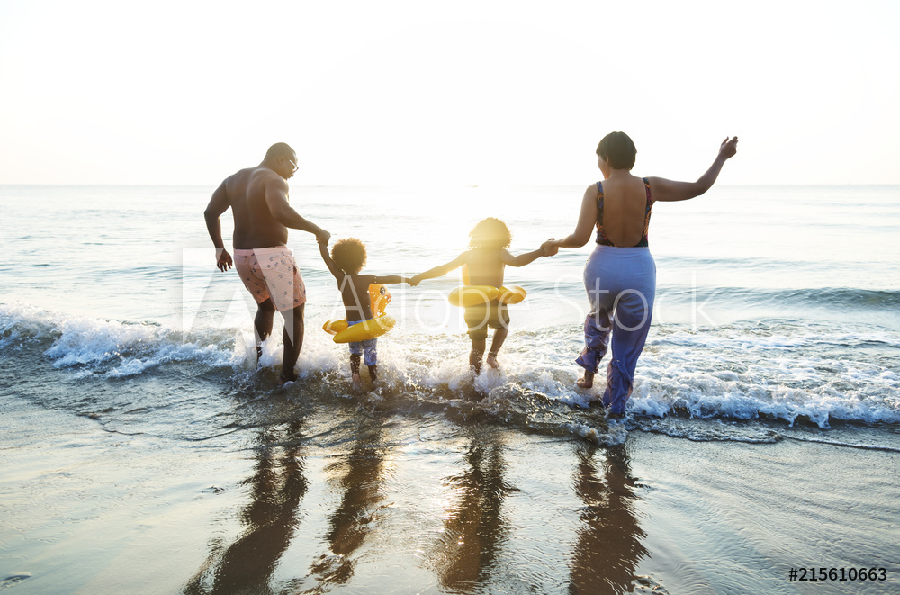 Family having fun at the beach