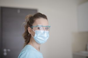 Dentist wearing personal protective equipment. 